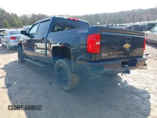 2017 Chevrolet Silverado 1500 LT with VIN 3GCUKREC6HG451671, listed as a IAAI auction lot 41906060 with Not Provided miles and . Bid and sale history available at DreamBid. Image 3.