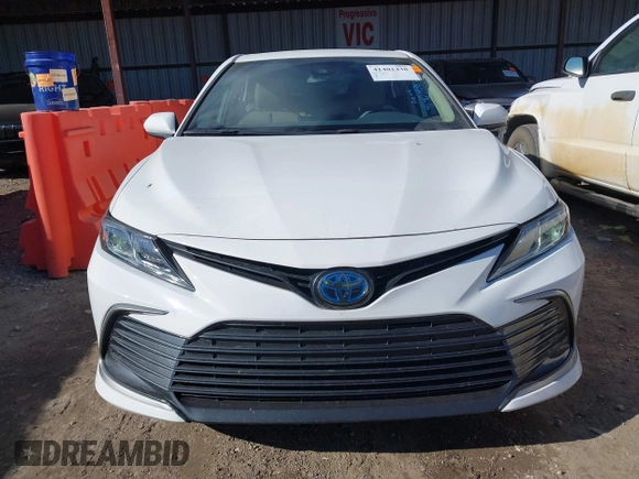 2022 Toyota Camry Hybrid LE with VIN 4T1C31AK7NU588937, listed as a IAAI auction lot 41401438 with 50,361 mi miles and . Bid and sale history available at carsss.com. Image 13.