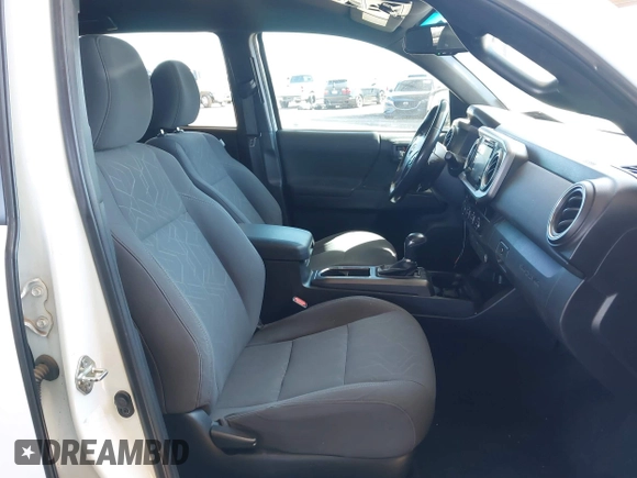 2016 Toyota Tacoma SR with VIN 5TFCZ5ANXGX028464, listed as a IAAI auction lot 41834385 with 124,407 mi miles and . Bid and sale history available at DreamBid. Image 5.