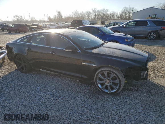 2015 Jaguar XJ with VIN SAJWA1CZ8F8V85381, listed as a Copart auction lot 42592495 with 161,938 mi miles and Salvage title. Bid and sale history available at DreamBid. Image 4.
