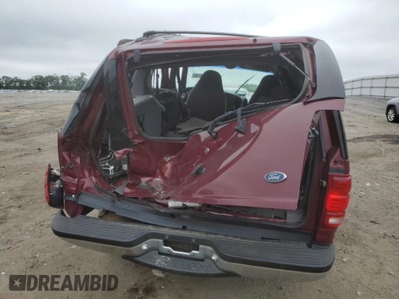 1999 Ford Expedition XLT with VIN 1FMPU18L6XLA61106, listed as a Copart auction lot 62688735 with 105,551 mi miles and Salvage title. Bid and sale history available at DreamBid. Image 6.