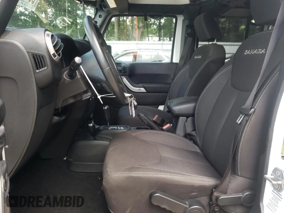 2017 Jeep Wrangler Unlimited Sahara with VIN 1C4HJWEG8HL580262, listed as a Copart auction lot 60118455 with 63,075 mi miles and Salvage title. Bid and sale history available at DreamBid. Image 7.