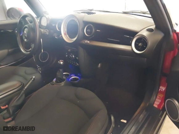 2014 MINI Cooper Convertible S with VIN WMWZP3C59ET298305, listed as a IAAI auction lot 41679657 with 77,736 mi miles. Bid and sale history available at carsss.com. Image 5.