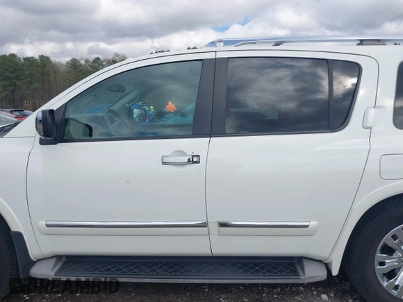 2015 Nissan Armada Platinum z VIN 5N1BA0NF9FN606276, wystawiony jako IAAI lot #41865375 z przebiegiem 223 761 mil mil oraz . Historia ofert i sprzedaży dostępna na DreamBid. Obrazek 15.