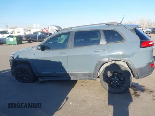 2015 Jeep Cherokee Trailhawk with VIN 1C4PJMBS3FW510219, listed as a IAAI auction lot 41440297 with 144,012 mi miles and . Bid and sale history available at DreamBid. Image 12.
