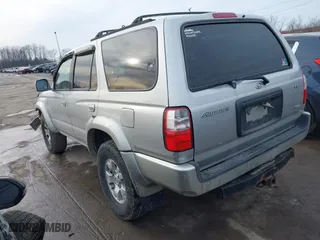 2001 Toyota 4Runner SR5 with VIN JT3GN86R210191592, listed as a IAAI auction lot 41574192 with 217,702 mi miles. Bid and sale history available at carsss.com. Image 3.