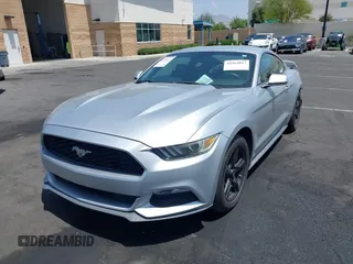 2015 Ford Mustang V6 with VIN 1FA6P8AM1F5342967, listed as a IAAI auction lot 42164817 with 106,700 mi miles and . Bid and sale history available at DreamBid. Image 2.