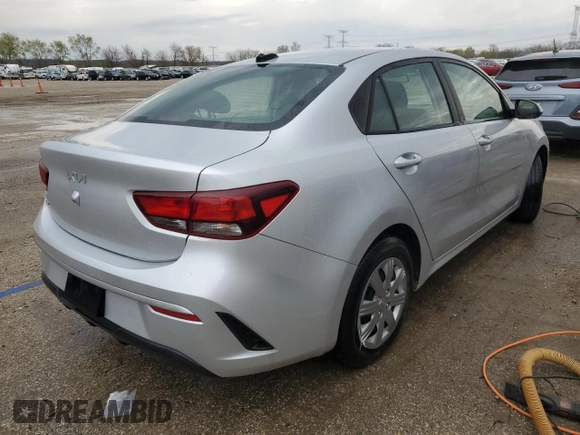 2023 Kia Rio S z VIN 3KPA24AD5PE516136, wystawiony jako Copart lot #52609525 z przebiegiem 52 379 mil mil oraz Szkoda całkowita • Salvage title. Historia ofert i sprzedaży dostępna na DreamBid. Obrazek 3.