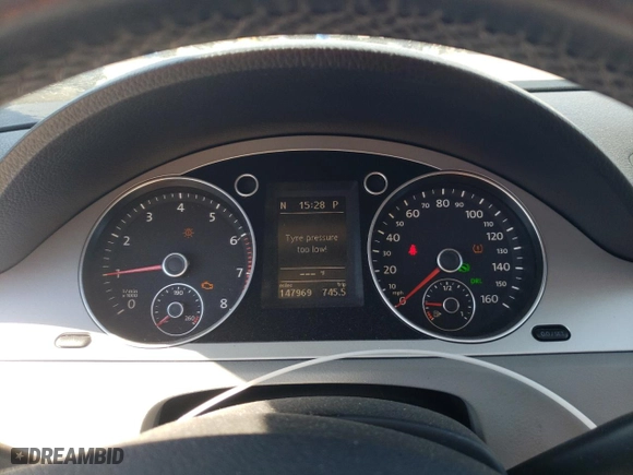 2009 Volkswagen Passat Sedan Komfort with VIN WVWJK73C69P055294, listed as a Copart auction lot 75385664 with 147,969 mi miles and Salvage Title. Bid and sale history available at carsss.com. Image 9.