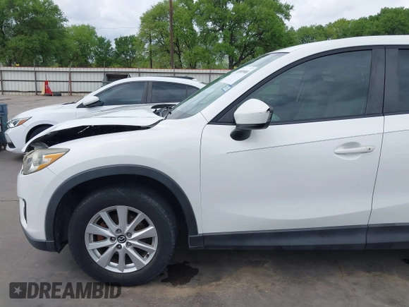 2013 Mazda CX-5 Touring with VIN JM3KE2CE5D0117714, listed as a IAAI auction lot 41889900 with 200,949 mi miles. Bid and sale history available at carsss.com. Image 17.