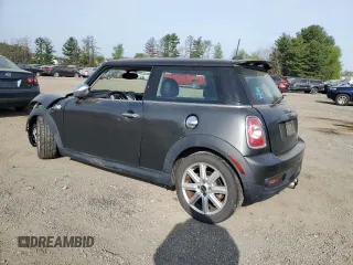 2011 MINI Hardtop S with VIN WMWSV3C55BTY13142, listed as a Copart auction lot 54543905 with Not Provided miles and Salvage Title. Bid and sale history available at DreamBid. Image 2.