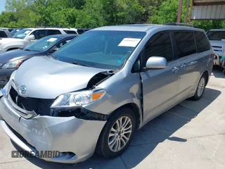 2015 Toyota Sienna XLE with VIN 5TDYK3DC0FS555636, listed as a IAAI auction lot 42099577 with 114,975 mi miles. Bid and sale history available at carsss.com. Image 17.