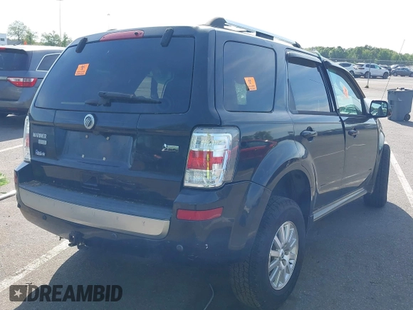 2011 Mercury Mariner Premier with VIN 4M2CN9HG7BKJ01459, listed as a IAAI auction lot 42231597 with 168,362 mi miles and . Bid and sale history available at DreamBid. Image 4.