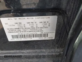 2007 Mazda 3 S Touring with VIN JM1BK324971662376, listed as a IAAI auction lot 41600343 with 143,325 mi miles and . Bid and sale history available at DreamBid. Image 9.