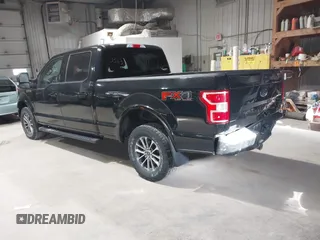 2018 Ford F-150 XL with VIN 1FTFW1E56JFD06640, listed as a IAAI auction lot 41983563 with 63,092 mi miles. Bid and sale history available at carsss.com. Image 3.