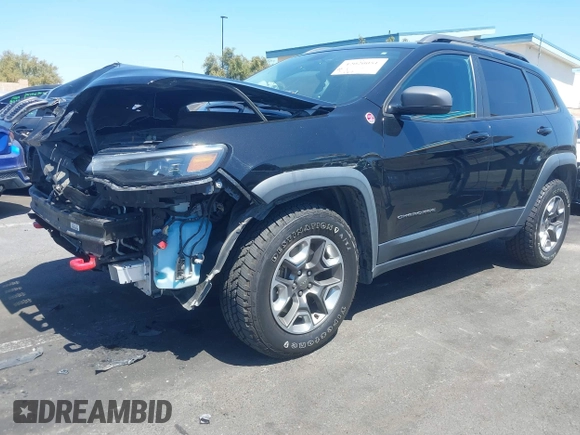 2019 Jeep Cherokee Trailhawk with VIN 1C4PJMBXXKD433284, listed as a IAAI auction lot 42020051 with 57,089 mi miles and . Bid and sale history available at DreamBid. Image 2.