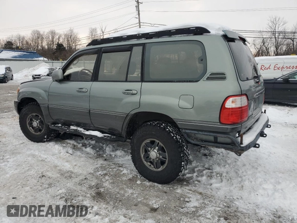 2002 Lexus LX 470 z VIN JTJHT00W923514121, wystawiony jako Copart lot #87761105 z przebiegiem 247 752 mil mil oraz Szkody całkowita. Historia ofert i sprzedaży dostępna na DreamBid. Obrazek 2.