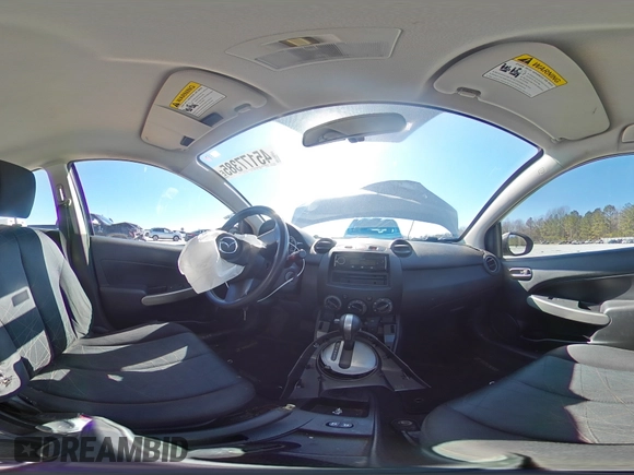 2012 Mazda 2 Sport with VIN JM1DE1KZ2C0149132, listed as a Copart auction lot 45177385 with 146,966 mi miles and Salvage Title. Bid and sale history available at DreamBid. Image 12.