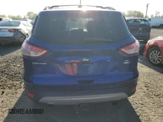 2014 Ford Escape SE z VIN 1FMCU9G95EUB88150, wystawiony jako Copart lot #52570095 z przebiegiem 143 129 mil mil oraz Szkoda całkowita • Salvage title. Historia ofert i sprzedaży dostępna na DreamBid. Obrazek 6.