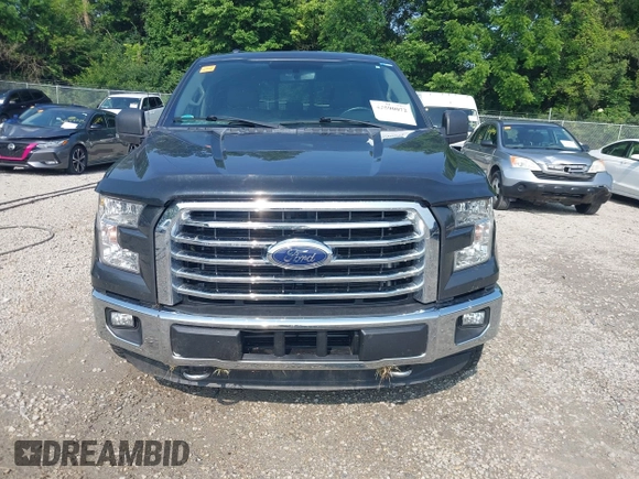 2015 Ford F-150 XLT with VIN 1FTEW1EG1FFB89473, listed as a IAAI auction lot 42590072 with 142,614 mi miles and . Bid and sale history available at DreamBid. Image 12.