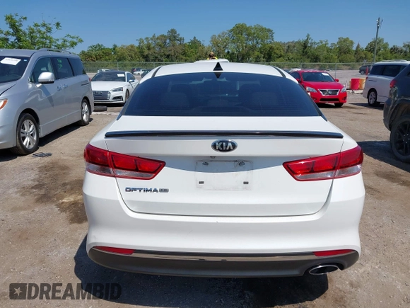 2016 Kia Optima LX with VIN KNAGT4L32G5085128, listed as a IAAI auction lot 42016728 with 259,218 mi miles. Bid and sale history available at carsss.com. Image 16.