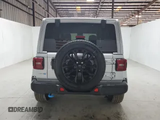 2024 Jeep Wrangler Sahara z VIN 1C4RJXP64RW226978, wystawiony jako Copart lot #58173745 z przebiegiem 31 841 mil mil oraz Czysty tytuł • Clean title. Historia ofert i sprzedaży dostępna na DreamBid. Obrazek 6.
