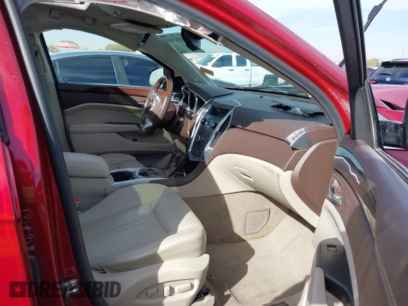 2012 Cadillac SRX Performance Collection with VIN 3GYFNBE35CS533639, listed as a IAAI auction lot 41532684 with 93,637 mi miles and . Bid and sale history available at DreamBid. Image 5.