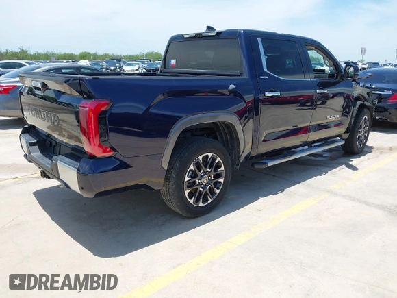 2023 Toyota Tundra Limited with VIN 5TFJA5DB9PX117183, listed as a IAAI auction lot 42352970 with 15,082 mi miles and . Bid and sale history available at DreamBid. Image 4.