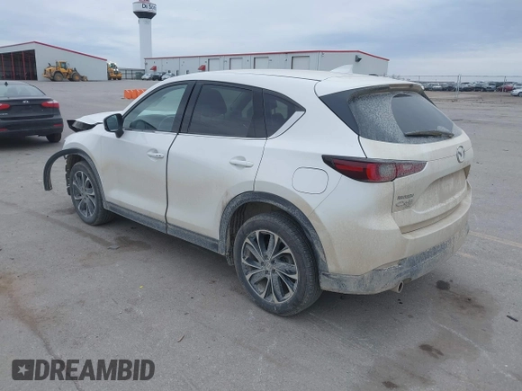 2023 Mazda CX-5 2.5 S Premium Plus Package with VIN JM3KFBEMXP0103278, listed as a IAAI auction lot 40954999 with 100,798 mi miles. Bid and sale history available at carsss.com. Image 3.
