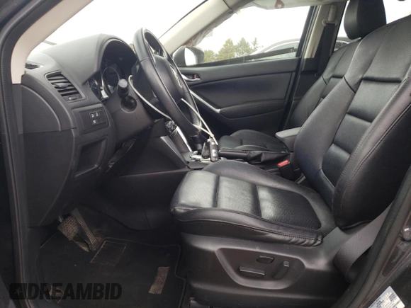 2015 Mazda CX-5 Grand Touring with VIN JM3KE4DY2F0526535, listed as a Copart auction lot 53046855 with 90,288 mi miles and Salvage Title. Bid and sale history available at DreamBid. Image 7.