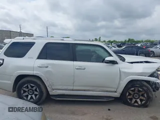 2014 Toyota 4Runner SR5 with VIN JTEZU5JR7E5080554, listed as a IAAI auction lot 42134833 with 170,077 mi miles and . Bid and sale history available at DreamBid. Image 14.