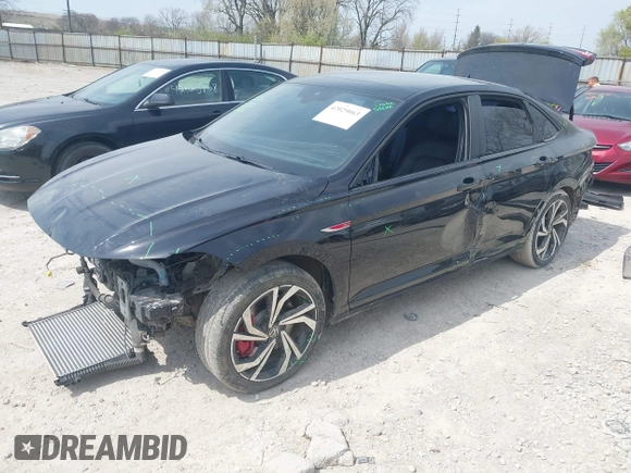 2023 Volkswagen Jetta GLI Autobahn z VIN 3VW2T7BU2PM054137, wystawiony jako IAAI lot #42029063 z przebiegiem 17 456 mil mil oraz . Historia ofert i sprzedaży dostępna na DreamBid. Obrazek 18.