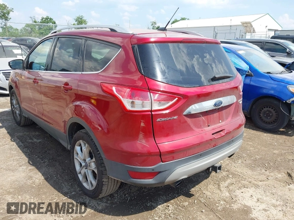 2015 Ford Escape Titanium z VIN 1FMCU9J91FUC58933, wystawiony jako IAAI lot #42583736 z przebiegiem 147 359 mil mil oraz . Historia ofert i sprzedaży dostępna na DreamBid. Obrazek 3.