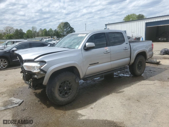 2020 Toyota Tacoma 4WD SR5 with VIN 3TMCZ5AN6LM310312, listed as a Copart auction lot 50162955 with 82,710 mi miles and Salvage Title. Bid and sale history available at carsss.com. Image 1.