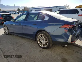 2024 BMW 5 Series 530i with VIN WBA43FJ01RCP88936, listed as a Copart auction lot 82317654 with 9,738 mi miles and Salvage Title. Bid and sale history available at carsss.com. Image 2.
