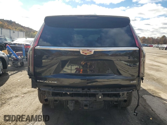 2024 Cadillac Escalade 4WD Premium Luxury with VIN 1GYS4BKL1RR181502, listed as a Copart auction lot 77155704 with 6,588 mi miles and Salvage title. Bid and sale history available at DreamBid. Image 6.