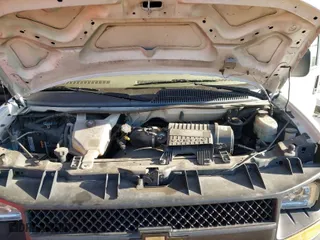 2014 Chevrolet Express Cargo Van with VIN 1GCSGAFX9E1135879, listed as a IAAI auction lot 41586730 with 199,454 mi miles. Bid and sale history available at carsss.com. Image 10.