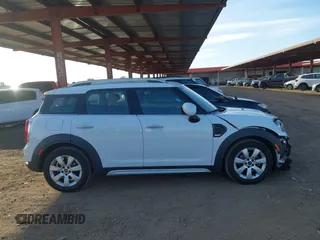 2019 MINI Countryman Cooper z VIN WMZYS7C51K3F46419, wystawiony jako IAAI lot #41228467 z przebiegiem 59 154 mil mil oraz . Historia ofert i sprzedaży dostępna na DreamBid. Obrazek 13.