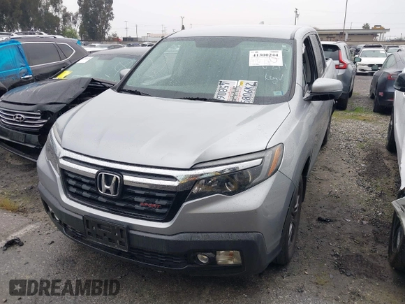 2018 Honda Ridgeline Sport with VIN 5FPYK2F19JB000713, listed as a IAAI auction lot 41300244 with 52,119 mi miles and . Bid and sale history available at DreamBid. Image 12.