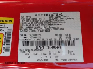 2023 Ford Mustang EcoBoost z VIN 1FA6P8TH3P5109478, wystawiony jako IAAI lot #41977565 z przebiegiem 38 475 mil mil oraz . Historia ofert i sprzedaży dostępna na DreamBid. Obrazek 9.