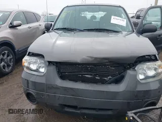 2006 Ford Escape XLS with VIN 1FMYU02Z26KA03834, listed as a IAAI auction lot 41447539 with 168,160 mi miles and . Bid and sale history available at DreamBid. Image 6.