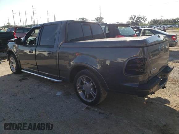 2002 Ford F-150 Harley Davidson with VIN 1FTRW07392KD46352, listed as a Copart auction lot 73463924 with 135,813 mi miles and Salvage Title. Bid and sale history available at carsss.com. Image 2.