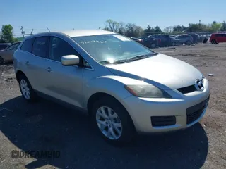 2009 Mazda CX-7 Grand Touring with VIN JM3ER29L990217023, listed as a IAAI auction lot 42005360 with 80,897 mi miles. Bid and sale history available at carsss.com. Image 1.