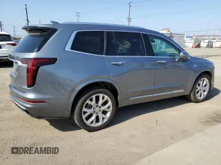 2020 Cadillac XT6 FWD Premium Luxury with VIN 1GYKPCRS5LZ201302, listed as a Copart auction lot 55103225 with 61,527 mi miles and Salvage Title. Bid and sale history available at carsss.com. Image 3.