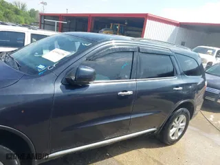 2013 Dodge Durango Crew with VIN 1C4RDHDG6DC665135, listed as a IAAI auction lot 41994158 with 213,891 mi miles. Bid and sale history available at carsss.com. Image 14.