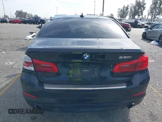2018 BMW 5 Series 530i with VIN WBAJA5C56JG897692, listed as a IAAI auction lot 41813052 with 37,610 mi miles and . Bid and sale history available at DreamBid. Image 16.