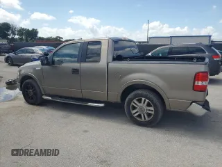 2005 Ford F-150 XLT with VIN 1FTRX12585FA42177, listed as a Copart auction lot 64841645 with 153,779 mi miles and Salvage title. Bid and sale history available at DreamBid. Image 2.
