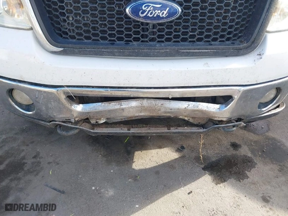 2007 Ford F-150 XLT with VIN 1FTPW14567KD58999, listed as a IAAI auction lot 40896476 with 210,997 mi miles. Bid and sale history available at carsss.com. Image 6.