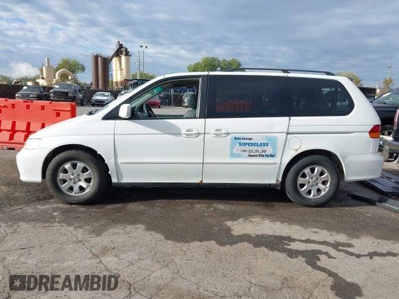 2004 Honda Odyssey EX-L with VIN 5FNRL18074B109717, listed as a IAAI auction lot 37731273 with 314,449 mi miles and . Bid and sale history available at DreamBid. Image 14.