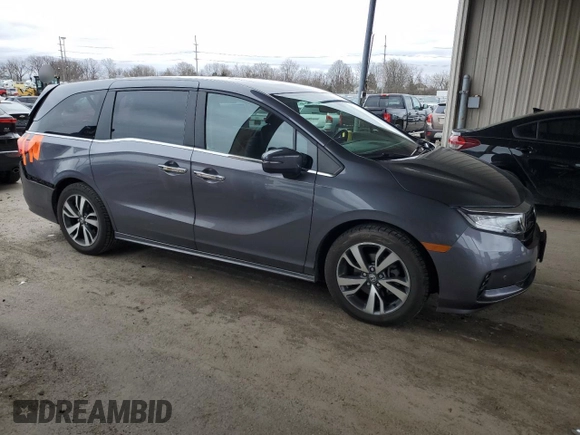 2022 Honda Odyssey Touring with VIN 5FNRL6H85NB023052, listed as a Copart auction lot 50884735 with 54,952 mi miles and Salvage Title. Bid and sale history available at DreamBid. Image 4.